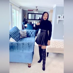 FAUX LEATHER PLEATED SKIRT
NWOT 
SMOKE FREE HOME